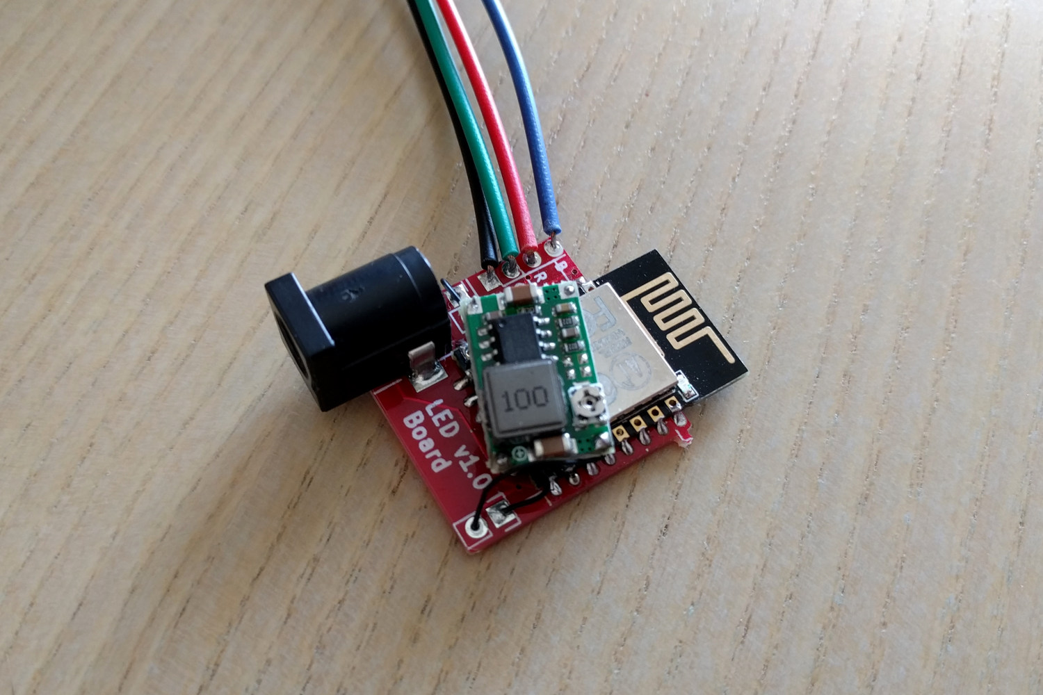 A PCB with stuff on it and cables coming out of it.